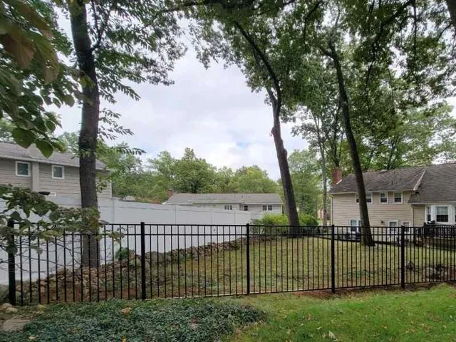 Black ornamental aluminum fence at a commercial property in NJ