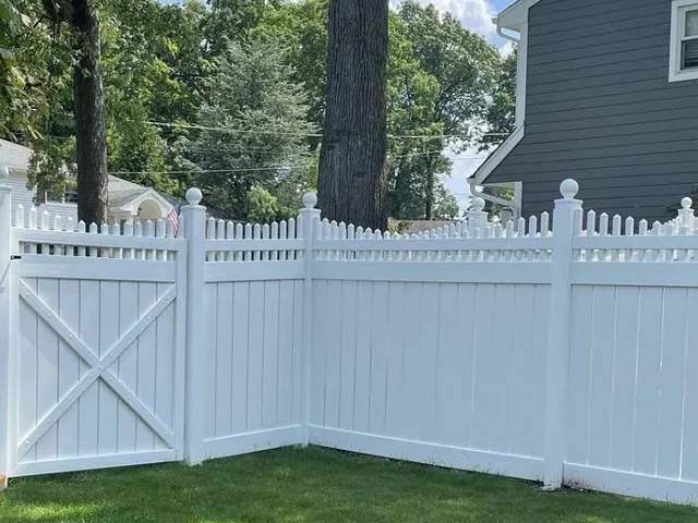 White vinyl fence install at a residential New Jersey backyard